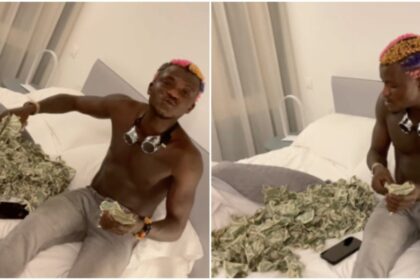 “I no go school, but I get US dollars” – Singer Portable flaunts cash he made from performance