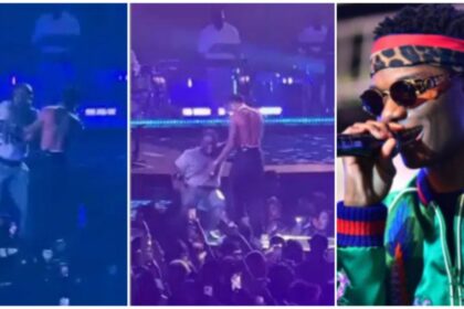Excited fan jumps on stage to hug Wizkid during performance