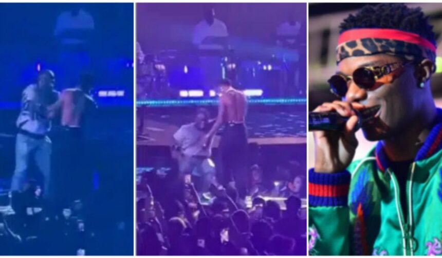Excited fan jumps on stage to hug Wizkid during performance