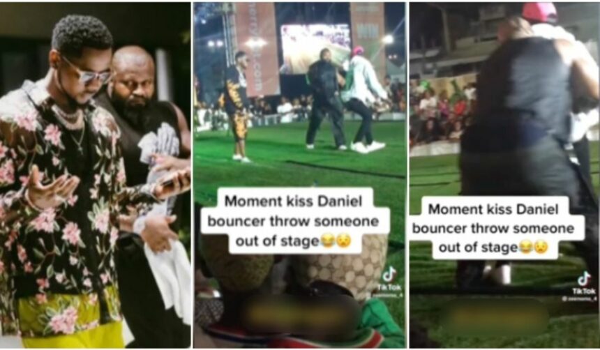 Kizz Daniel’s bodyguard flings man off stage after he tried to dance with singer