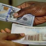 Naira strengthens as US Dollar crashes to N1,450 after CBN interest rate hike