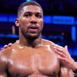 Anthony Joshua reacts to Tyson Fury calling him a ‘sausage’ among other insults